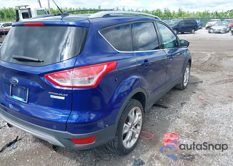 2013 Ford Escape Titanium z USA, uszkodzony, nr VIN 1FMCU0J95DUD37885